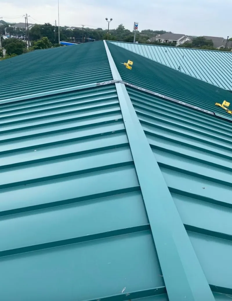 Green commercial metal roof ridge and valley for Metal Roof Repair in Chubbuck